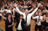 Wedding guests having fun captured by our wedding photographer